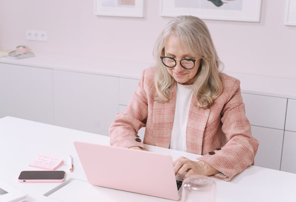 Woman in her late 50s ensuring she's fully prepared for retirement.