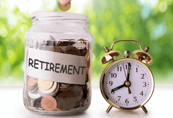 An image of a persons first time pension savings pot for retirement, with a clock. 