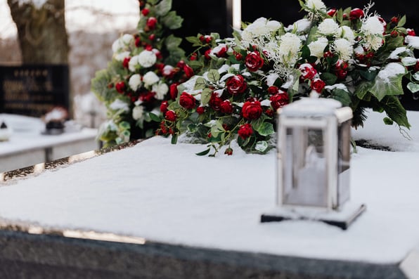 Flowers and a coffin of someone who has died without a will. 